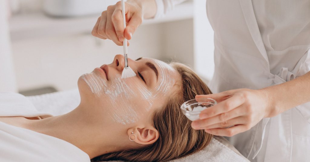 face treatment applying face mask